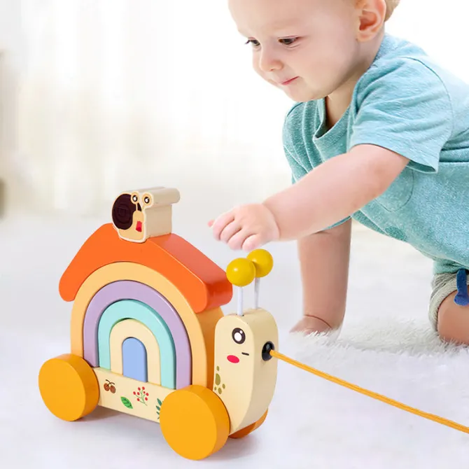 wooden_rainbow_snail_trac_1.webp Wooden Rainbow Snail Tractor- Fine motor skills toys
